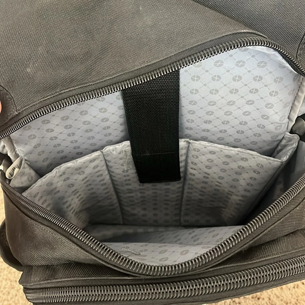 foray black and blue reflective laptop school backpack with many pockets